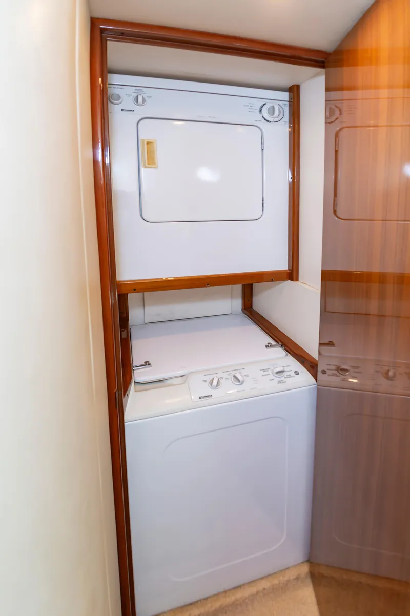 Slide: The Image of Stacked washer and dryer in 2005 Viking Convertible yacht interior. - 37