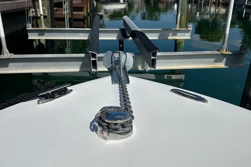 Slide: The Image of Bow of 1987 Whitewater 32 Open boat at dock with anchor chain. - 9