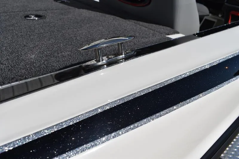 Slide: The Image of 2024 Triton 179 TrX boat deck with sleek design and metallic accents. - 27