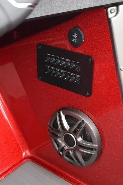 Slide: The Image of 2024 Triton 206 Allure boat interior with speaker and control panel. - 22