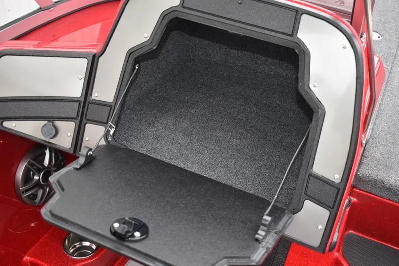 Slide: The Image of 2024 Triton 206 Allure boat storage compartment with open lid. - 25