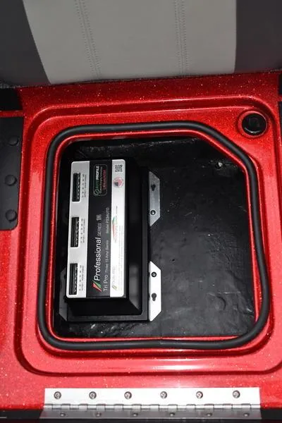 Slide: The Image of Battery compartment of 2024 Triton 206 Allure boat. - 32