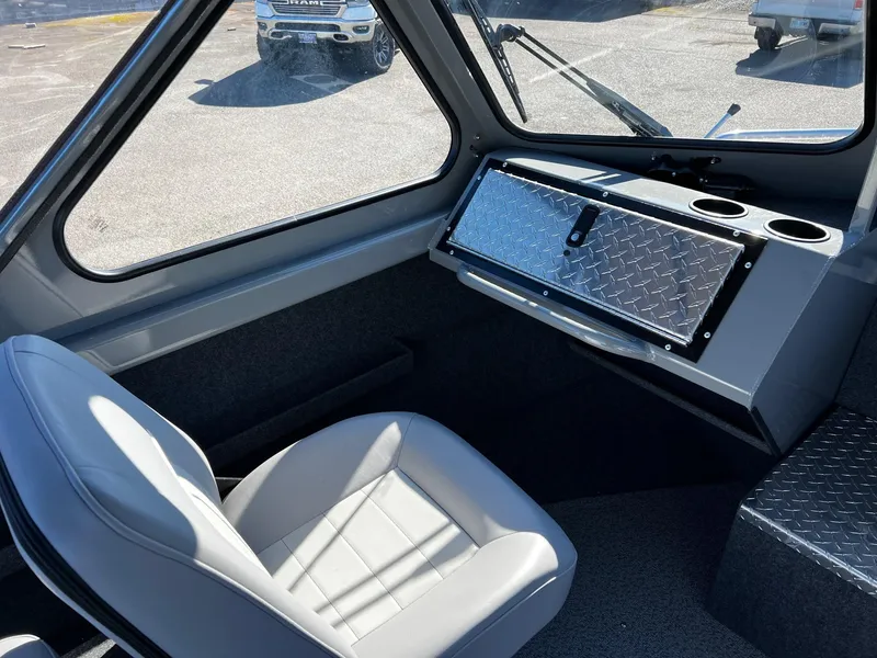 Slide: The Image of Interior of 2024 Thunder Jet 210 Luxor boat with driver's seat and dashboard. - 14