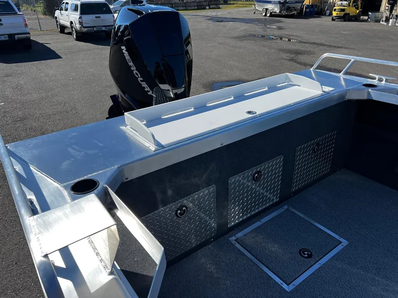 Slide: The Image of 2024 Thunder Jet 210 Luxor boat with Mercury outboard motor, rear deck view. - 18