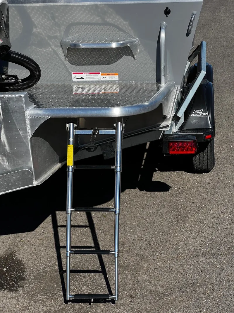 Slide: The Image of 2024 Thunder Jet 210 Luxor boat with rear boarding ladder. - 8