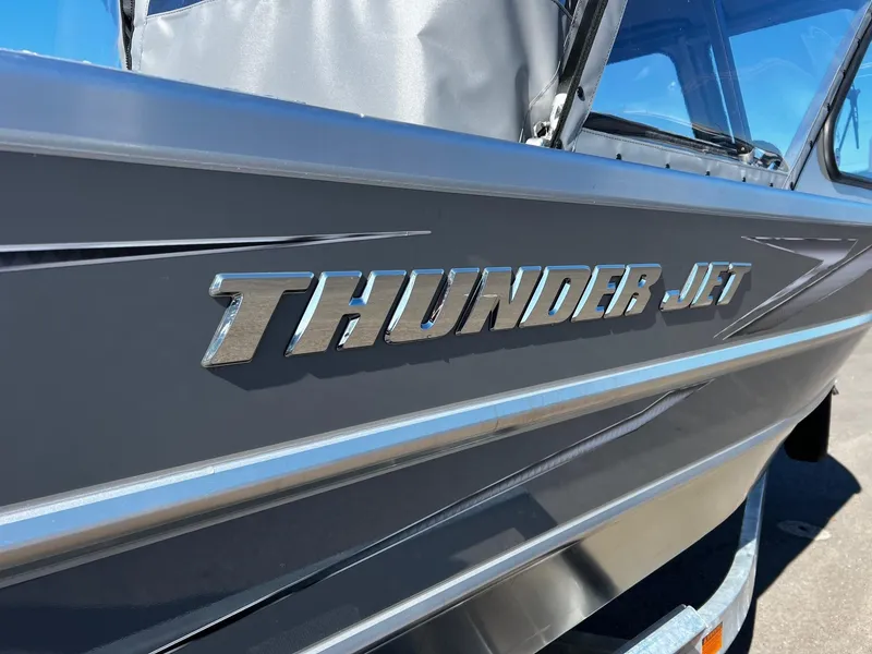 Slide: The Image of 2024 Thunder Jet 210 Luxor boat side view with logo. - 9