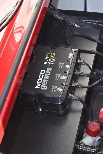 Slide: The Image of NOCO Genius GENPRO 10X3 charger in 2024 Triton 179 TrX boat. - 29