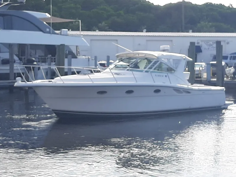 The Image of 2000 Tiara Sport 35 Open yacht docked in a marina. - 0