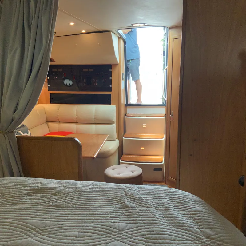 Slide: The Image of Interior of a 2000 Tiara Sport 35 Open yacht with seating and stairs. - 18