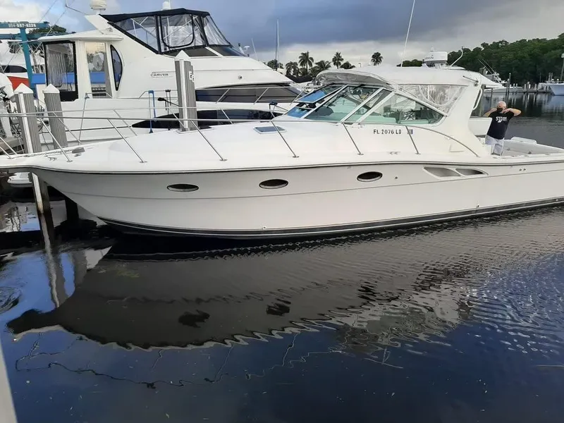 Slide: The Image of 2000 Tiara Sport 35 Open yacht docked at marina. - 2