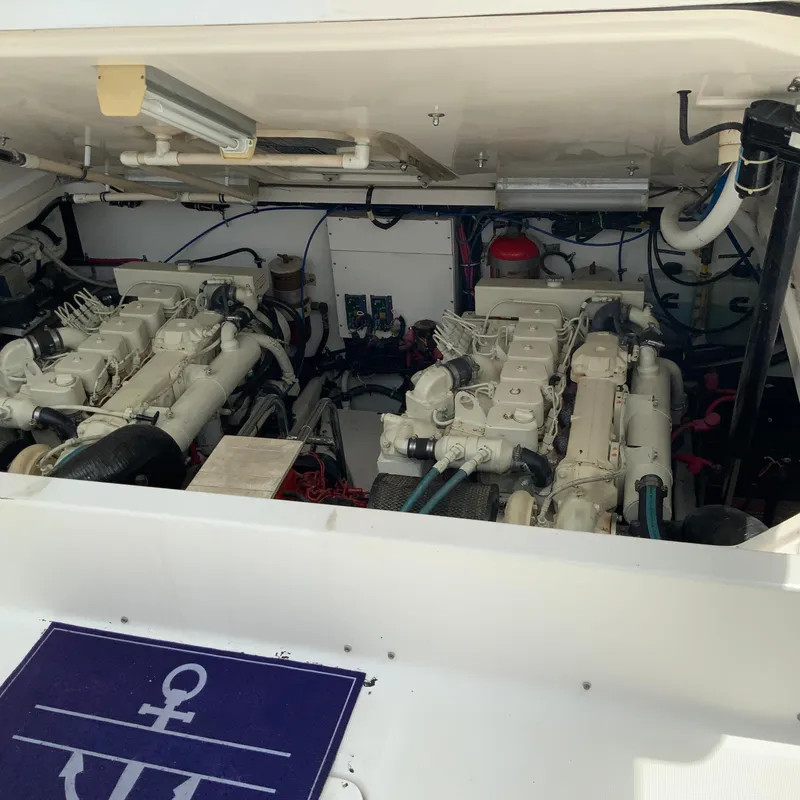 Slide: The Image of Engine compartment of a 2000 Tiara Sport 35 Open boat. - 30