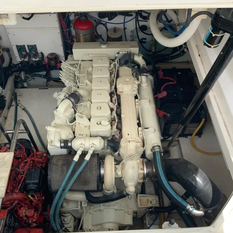 Slide: The Image of Engine compartment of a 2000 Tiara Sport 35 Open boat. - 31