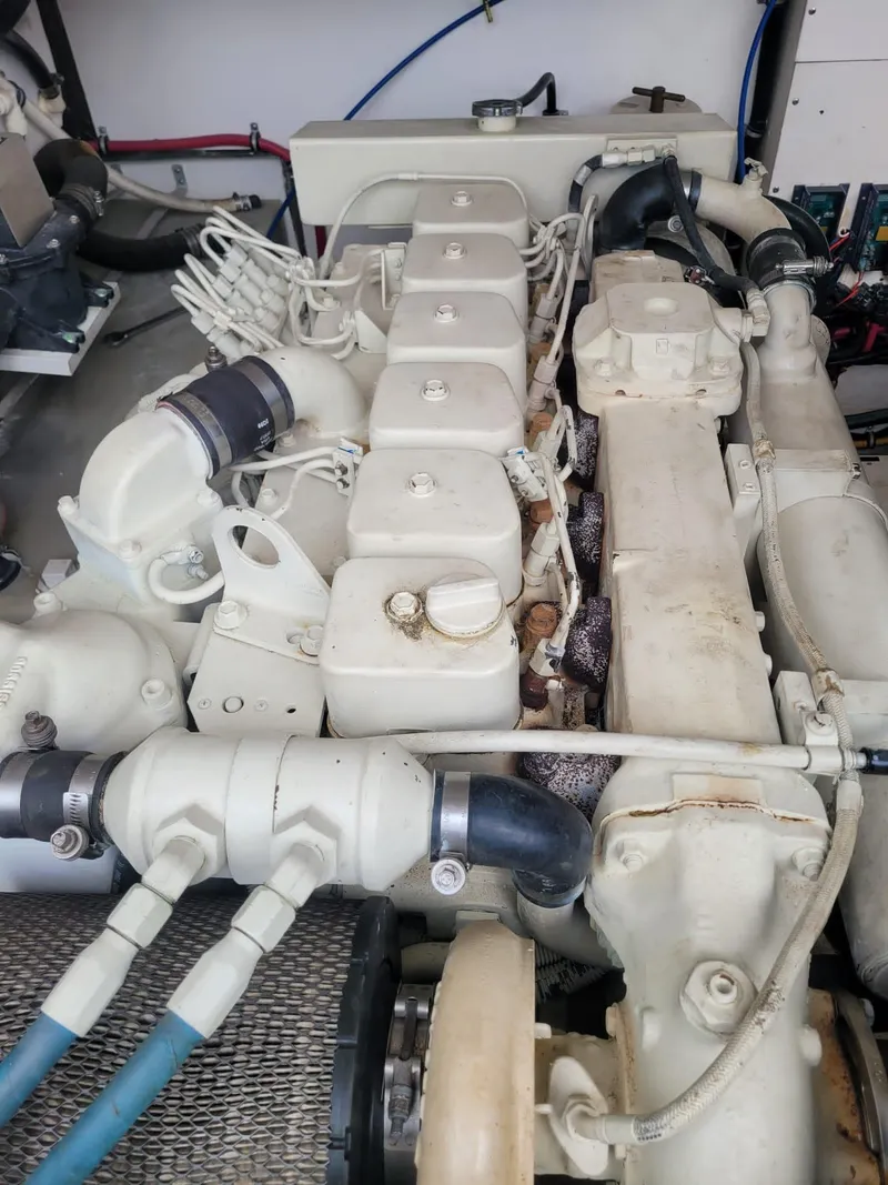 Slide: The Image of Engine of a 2000 Tiara Sport 35 Open boat, showcasing mechanical components. - 33