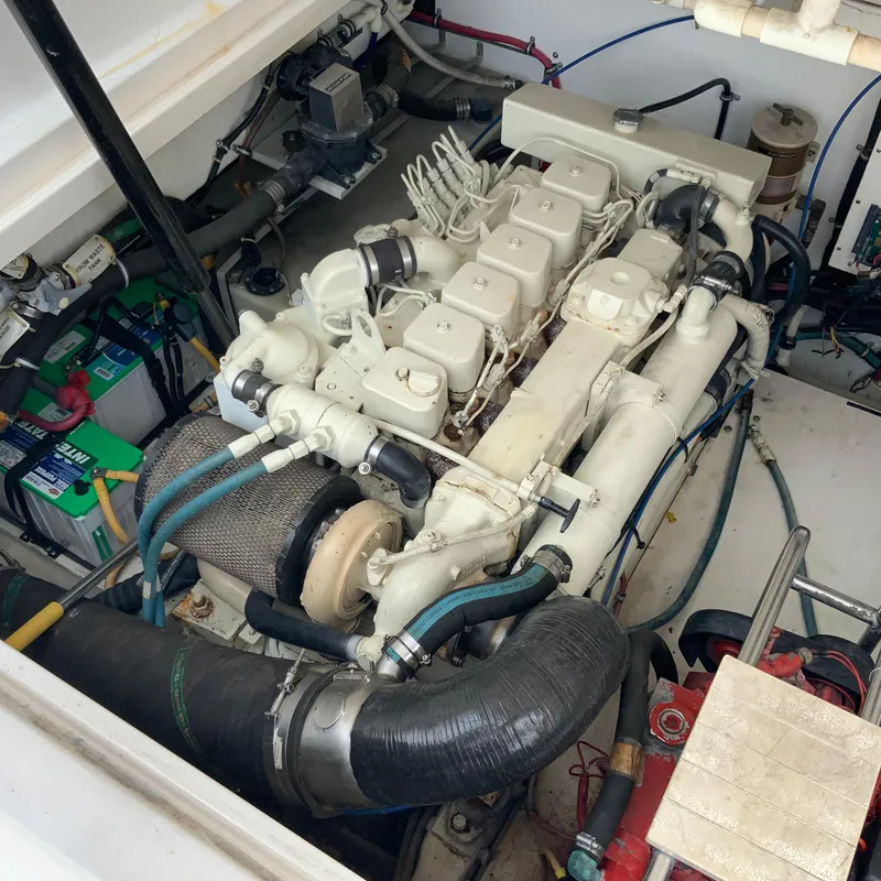 Slide: The Image of Engine compartment of a 2000 Tiara Sport 35 Open boat. - 34