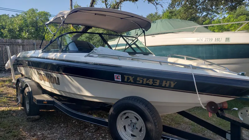 Slide: The Image of 1998 Malibu Sunsetter VLX boat on trailer with canopy, side view. - 0