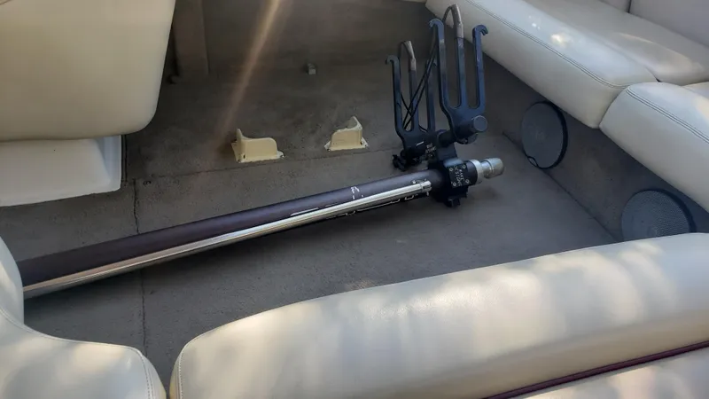 Slide: The Image of Interior of a 1998 Malibu Sunsetter VLX boat with a dismantled ski pylon. - 19