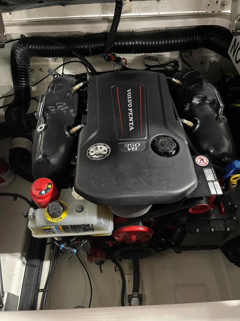 Slide: The Image of Engine compartment of a 2021 Chaparral 287 SSX with Volvo Penta V8 engine. - 18