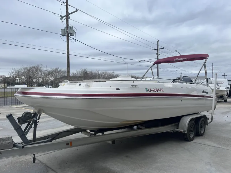 Slide: The Image of 2005 Hurricane 237 boat on trailer with red canopy. - 3