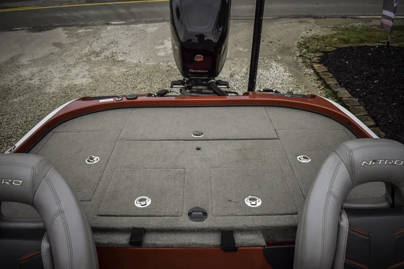 Slide: The Image of 2017 Nitro Z21 boat deck with storage compartments and motor. - 16