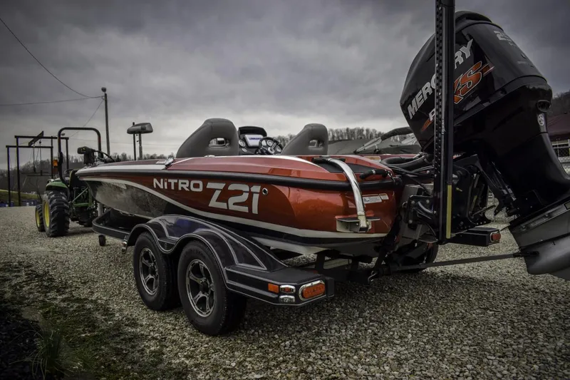 Slide: The Image of 2017 Nitro Z21 boat with Mercury engine on a trailer. - 3