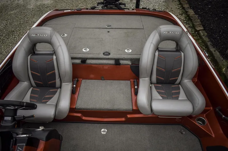 Slide: The Image of 2017 Nitro Z21 boat interior with dual seats and storage compartments. - 8