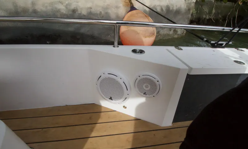 Slide: The Image of Speakers on the deck of a 2016 Axopar 28 TT boat. - 15