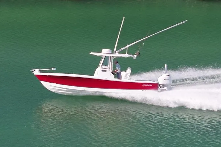 The Image of 2024 Regulator 26XO boat on stands, clear sky background. - 0