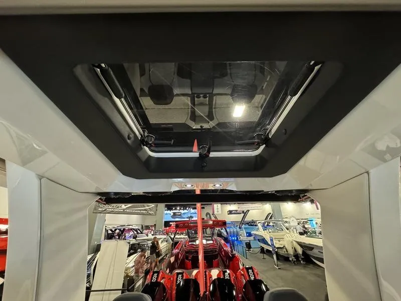 Slide: The Image of Interior view of 2025 Fountain 43 SCX boat at a showroom. - 17