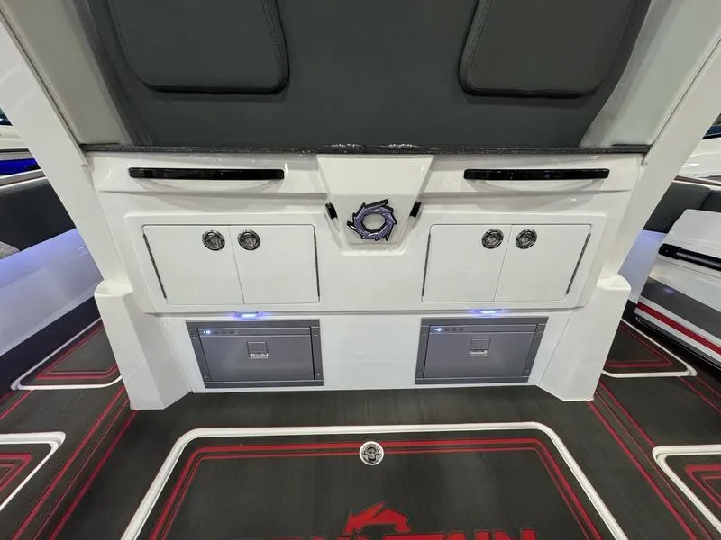 Slide: The Image of 2025 Fountain 43 SCX boat interior with storage compartments and modern design. - 5