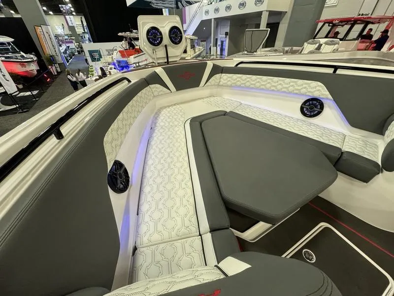 Slide: The Image of 2025 Fountain 43 SCX luxury boat interior with cushioned seating and modern design. - 6