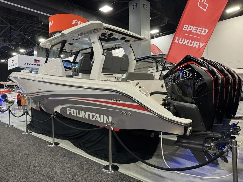 Slide: The Image of 2025 Fountain 43 SCX speedboat displayed at a boat show. - 9