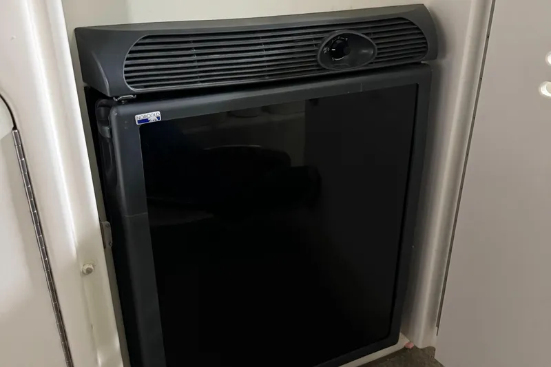 Slide: The Image of Compact refrigerator in 2008 Sea Ray 38 Sundancer yacht cabin. - 15