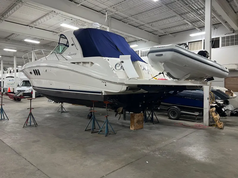 Slide: The Image of 2008 Sea Ray 38 Sundancer yacht in indoor storage on stands. - 2