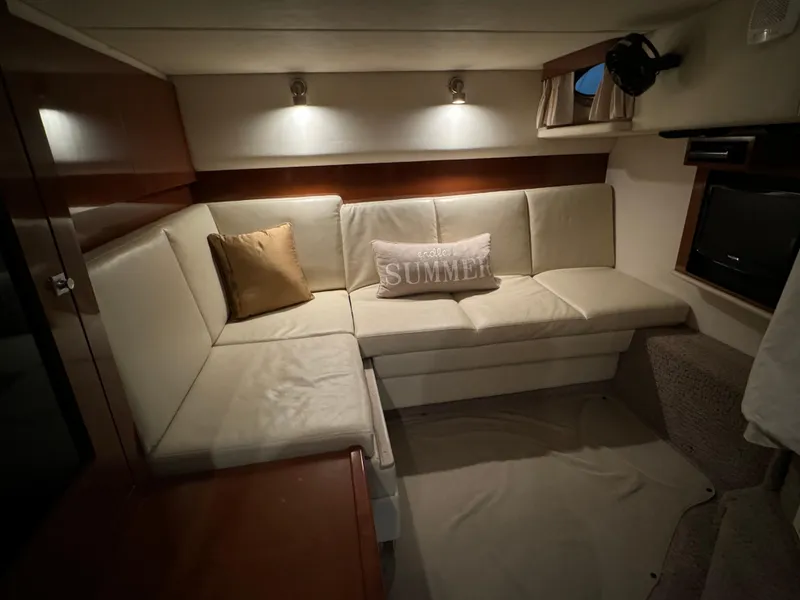 Slide: The Image of Luxurious interior of 2008 Sea Ray 38 Sundancer with cozy seating area. - 24