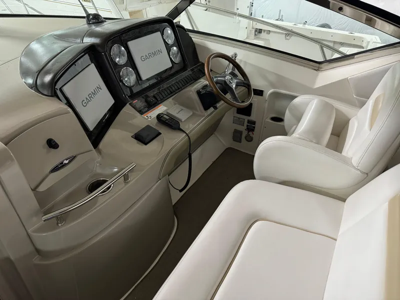Slide: The Image of 2008 Sea Ray 38 Sundancer helm with Garmin navigation system. - 6