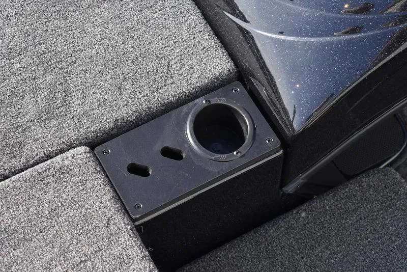 Slide: The Image of Cup holder and storage compartment in 2024 Triton 18 TrX boat. - 18