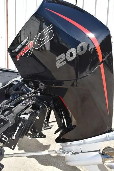 Slide: The Image of 2024 Triton 18 TrX with Mercury Pro XS 200 outboard motor. - 9