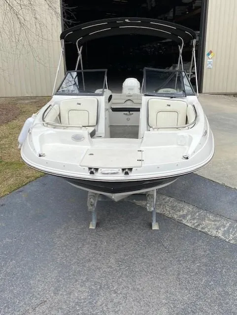 Slide: The Image of 2020 Stingray 201 DS boat with open bow and dual consoles. - 7