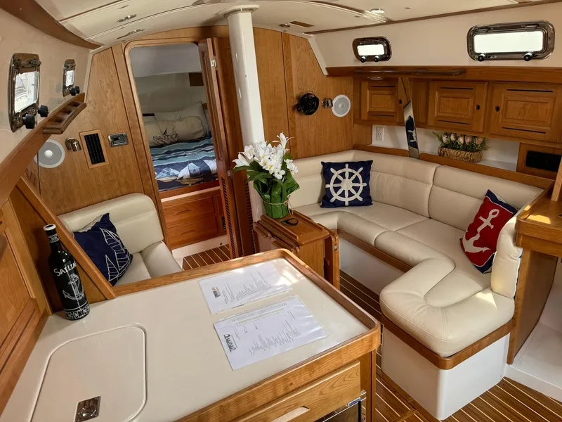 Slide: The Image of Luxurious interior of 2025 Tartan 365 yacht with elegant wood finish and nautical decor. - 15
