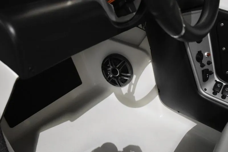 Slide: The Image of 2024 Triton 186 Allure boat interior with speaker and control panel. - 108