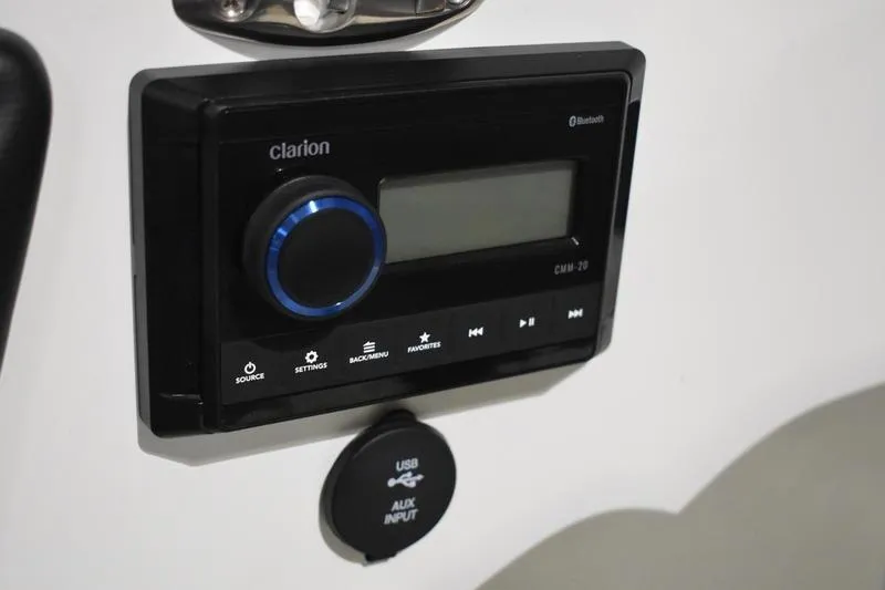 Slide: The Image of 2024 Triton 186 Allure boat stereo system with USB and Bluetooth connectivity. - 109