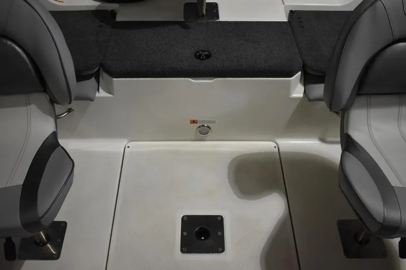 Slide: The Image of Interior seating of 2024 Triton 186 Allure boat, featuring gray cushioned seats. - 113