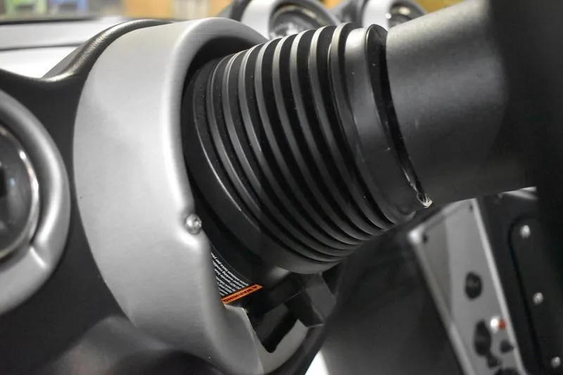 Slide: The Image of Close-up of 2024 Triton 186 Allure steering column detail. - 116