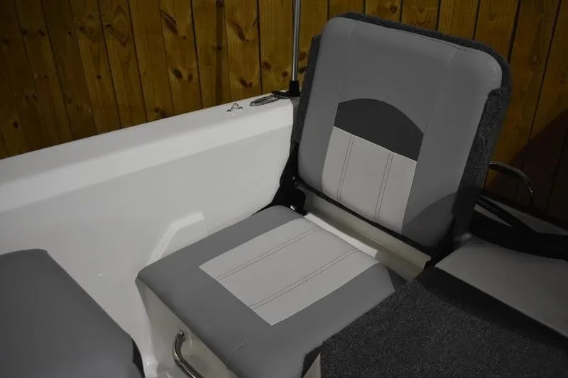 Slide: The Image of 2024 Triton 186 Allure boat seat with gray and white upholstery. - 122