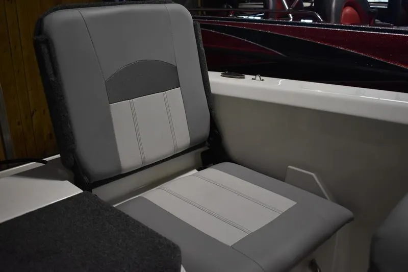 Slide: The Image of 2024 Triton 186 Allure boat seat with gray and white upholstery. - 129