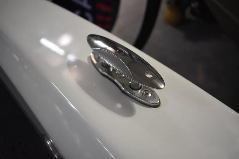Slide: The Image of 2024 Triton 186 Allure boat cleat on sleek white surface. - 135