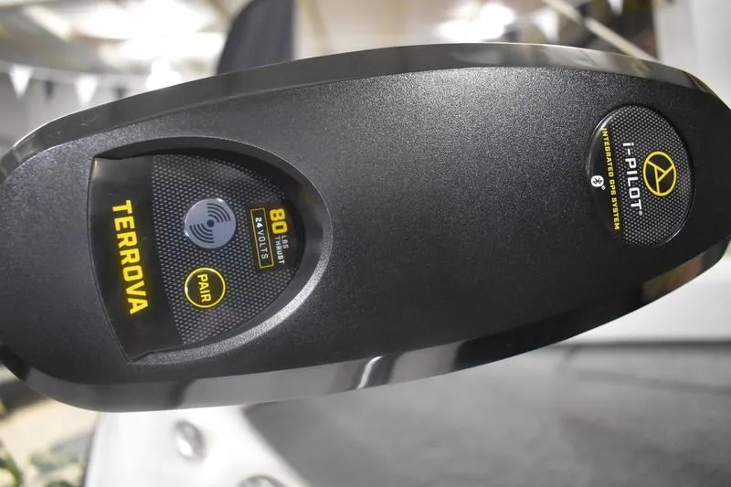 Slide: The Image of 2024 Triton 186 Allure boat interior with stainless steel handrail in showroom. - 15