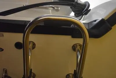 Slide: The Image of 2024 Triton 186 Allure boat interior with steering wheel and dashboard. - 30