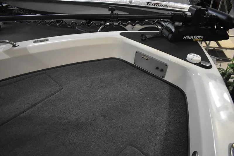 Slide: The Image of Steering wheel of 2024 Triton 186 Allure boat with dashboard gauges. - 39