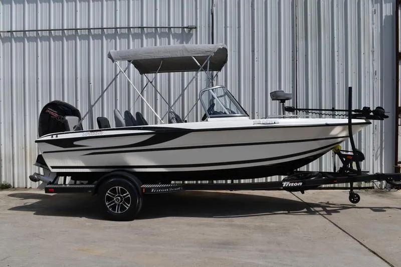 Slide: The Image of 2024 Triton 186 Allure boat ladder and railing detail. - 4